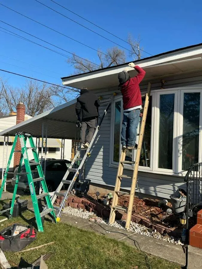 Restoration crew performing exterior repair in Pelham